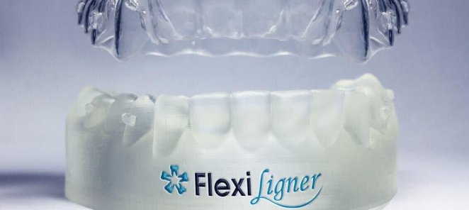 выравниванию зубов с помощью элайнеров системы FlexiLigner.