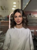Файзуллоева Инора