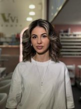 Файзуллоева Инора